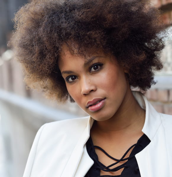 Beautiful black woman with afro kinky hair