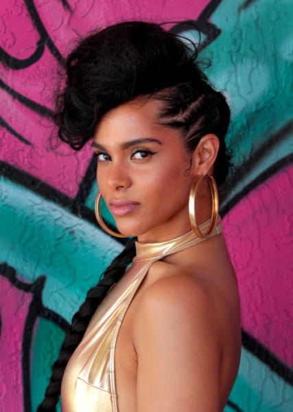 Young woman with goddess braids and cornrows